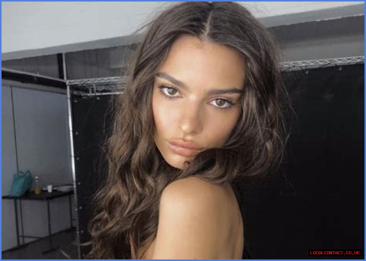 Emily Ratajkowski Puts On Cheeky Display In Barely-There Bathing Suit