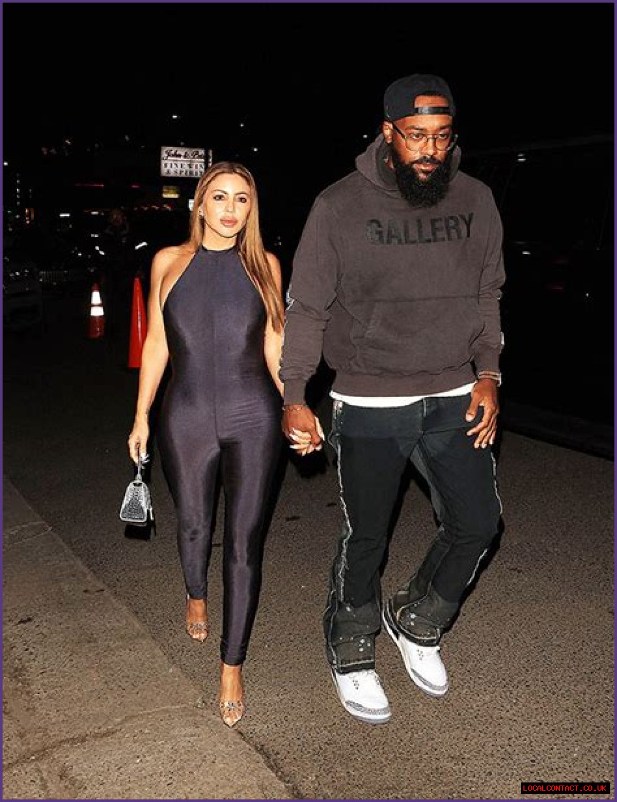 Larsa Pippen Stuns In Skintight Jumpsuit While Posing In Front Of A Red Ferrari 